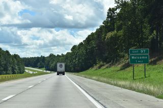 Interstate 285 passes west of the town of Midway ahead of Exit 97 to Old US Highway 52 (SR 2932).