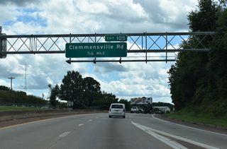 Clemmonsville Road (SR 2747) meets I-285/U.S. 52-NC 8 at Exit 105 south of I-40 at the Rosemont community in Winston-Salem.