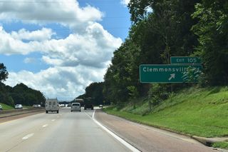 Clemmonsville Road (SR 2747) arcs 0.98 miles northeast from adjacent S Main Street (old U.S. 52/NC 8) to Old Lexington Road at Union Ridge.