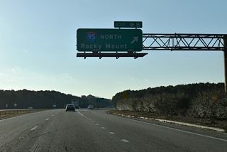 I-587 east and I-795 south commence along U.S. 264 east ahead of the loop ramp (Exit 18 B) for I-95 north to Rocky Mount and Richmond, Virginia.