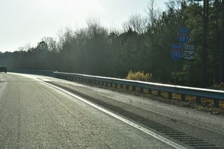 I-795 was established southward in 2007, with the route initially signed with shields only.