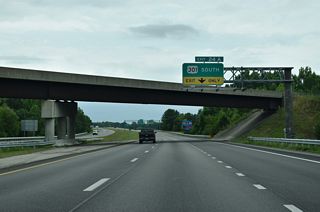 U.S. 301 meets I-587/U.S. 264 at a parclo interchange (Exit 24), 0.22 miles north of U.S. 117 south and 0.54 miles from I-795.