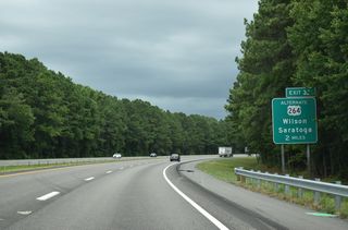 U.S. 264 Alternate arcs southeast from Toisnot Swamp to Drivers Store and I-587/U.S. 264 at Exit 32.