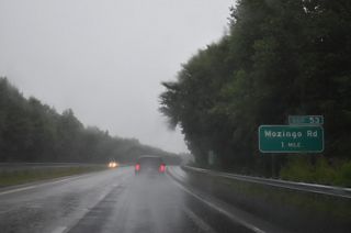 Interstate 587 passes north of Bell Arthur ahead of Exit 53 with Mozingo Road (SR 1210).
