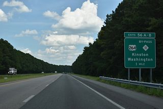 U.S. 264 and NC 11 Bypass arc around the city of Greenville along a partial freeway and arterial bypass.