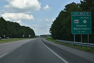 The cloverleaf interchange with U.S. 264 (Martin Luther King, Jr. Highway) was constructed in anticipation of the Southwest Bypass (NC 11 Bypass).