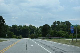 Interstate 587 concludes east of Mozingo Road (SR 1210) at the Greenville Bypass.