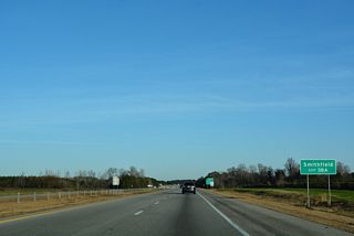 Exit 18 A connects with I-95 south 24 miles to Smithfield and 38 miles to Interstate 40 near Benson.
