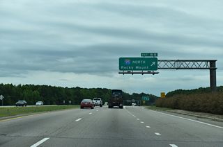 Exit 18 A leaves I-795 south / I-587-U.S. 264 east for Interstate 95 north to Rocky Mount and Petersburg, Virginia. A cloverleaf interchange joins the two freeways just outside the Wilson city limits.