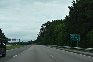 U.S. 117 parallels I-795 to the east through the towns of Fremont and Pikeville.
