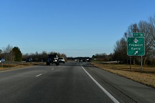 NC 222 travels west from I-795 four miles to NC 581 and nine miles to I-95 and U.S. 301 at Kenly.