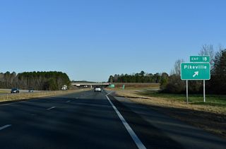 East into the town of Pikeville, SR 1002 follows Main Street to U.S. 117 (Goldsboro Street). Pikeville Princeton Road heads west from Exit 18 to NC 581 at Pike Crossroads.