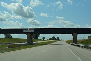 The Red River Valley &amp; Western Railroad spans Interstate 94 a half mile west of ND 18.