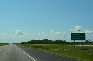 The first distance sign posted along I-94/U.S. 52 west in North Dakota is 12 miles ahead of the city of Casselton. Valley City follows in 50 miles while the capital city is 182 miles away.