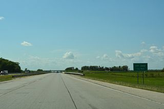 38th Street SW meets I-94/U.S. 52 at Exit 342 beyond the West Fargo city limits. Portions of former U.S. 10 and U.S. 52 follow the adjacent frontage road (37th Street SE) along this stretch.