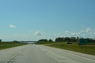 Westbound at the ranch exit with 38th Street on I-94/U.S. 52. 38th Street travels north from Exit 342 to Cass County Route 10 and south to 52nd Avenue S across open farm land.