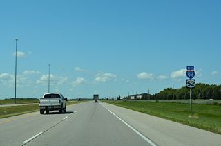I-94/U.S. 52 turns northwest and and leave the city of West Fargo ahead of 13th Avenue W.