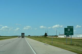 U.S. 10/Business Loop I-94 follow Main Avenue west from Downtown Fargo and West Fargo to a trumpet interchange at Exit 343.