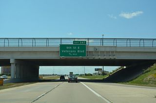 The first of three exits for the city of West Fargo on I-94/U.S. 52 west is with 9th Street E and Veterans Boulevard south. The parclo interchange at Exit 347 opened following a ribbon cutting ceremony held on October 1, 2009.