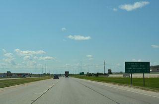 Suburban expansion of West Fargo spreads south of Interstate 94 from the succeeding two exits. 9th Street E was extended south of the freeway as newly built Veterans Boulevard in 2009.