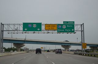Exit 349 A loops onto I-29/U.S. 81 south toward Sioux Falls, South Dakota and Omaha, Nebraska. A high flyover travels above between I-29/U.S. 81 south to I-94/U.S. 52 east. Interstate 29 leaves Fargo at 52nd Avenue S and Frontier and reaches I-90 at Sioux Falls in 232 miles.