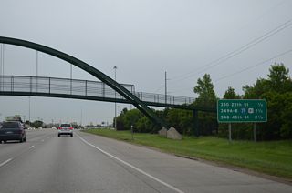 The next westbound exit joins I-94/U.S. 52 with 25th Street. 25th Street runs north to 12th Avenue N between the South High and Westgate neighborhoods.