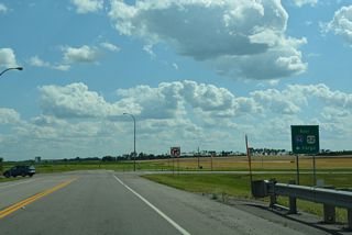 34th Street SE forms a service road along Interstate 94 west to 8th Street SE at 118th Avenue SE.