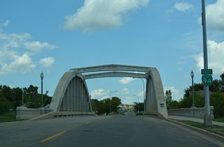Business Loop I-94 passes Municipal Tourist Park east ahead of the Sheyenne River.