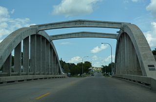 The concrete arch bridge spanning the Sheyenne River along Main Street was built in 2004.
