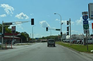 8th Avenue SW stems south from Main Street to I-94/U.S. 52 at Exit 292.