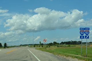 34th Street SE north at the diamond interchange (Exit 294) where Business Loop I-94 begins.