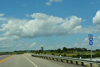 34th Street SE spans I-94/U.S. 52 north ahead of the westbound entrance ramp for Jamestown and Bismarck.