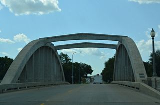 Business Loop I-94 advances west along Main Street across the Sheyenne River.