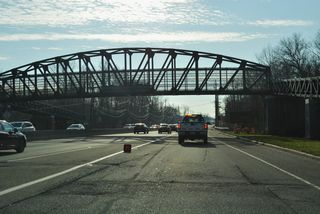 Part of the Delaware and Raritan Canal State Park trail, a pedestrian bridge spans U.S. 1 (Brunswick Avenue) just south of the exchange with Interstate 295.