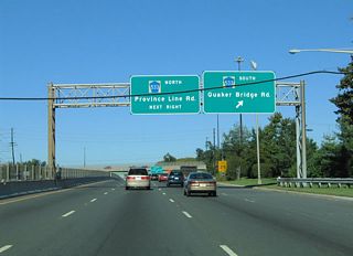 A collector distributor roadway ensues after Quakerbridge Mall for County Route 533 (Quaker Bridge Road) south to Mercerville and Province Line Road north to Mercer Mall and the Nassau Park Pavilion retail area.