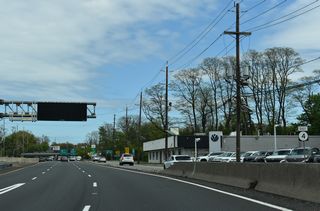 Route 208 concludes at a wye interchange with Route 4 (Broadway) east. A service road for Broadway joins Route 4 eastbound with Saddle River Road (CR 79) south in Fair Lawn.