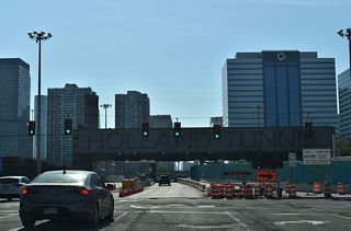 Interstate 78 intersects Marin Boulevard ahead of the west portal into the Holland Tunnel. Marin Boulevard leads north to the city of Hoboken and south by the Newport Centre mall.