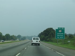 A pair of frontage roads accompany I-78/U.S. 22 between Exits 11 and 13. The north side frontage road doubles as Route 173 (former U.S. 22). The forthcoming ramps for Exit 12 tie into the adjacent roads for CR 635 (Perryville Road) north and south.