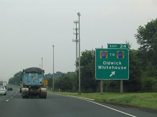 North of Exit 24, County Route 523 (Oldwick Road) turns east onto Lamington Road for Lamington and Bedminster Township east of Oldwick Road.