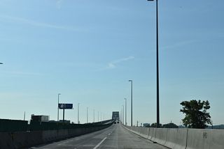 Interstate 78 travels across Newark Bay over a steel arch bridge. Constructed as part of the Newark Bay Extension between the Turnpike mainline and the Holland Tunnel, the bridge opened on April 4, 1956 at a cost of $40 million (Anderson, n.d.).