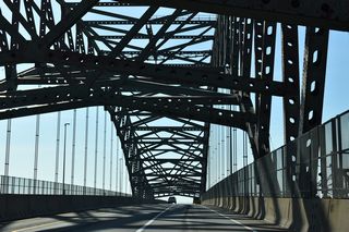 The Newark Bay Bridge provides 135 feet of clearance for vessels below (Anderson, n.d.).