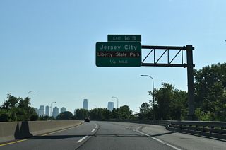 Bayview Avenue runs west from the trumpet interchange at Exit 14 B into the Jersey City street grid at Garfield Avenue.