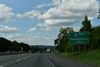 Curving northward through Pohatcong Township, Interstate 78 reaches the final mile in the Garden State.