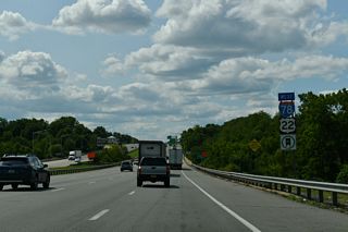 I-78/U.S. 22 cross the Musconetcong River and Warren County line ahead of a half diamond interchange (Exit 6) with Bloomsbury Road (CR 632).