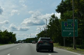 CR 523 (Oldwick Road) extends two miles south from Exit 24 by the UNICOM Science and Technology Park to U.S. 22 at Whitehouse.