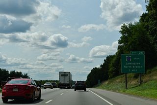 The final Somerset County exit joins I-78 west with CR 665 (Rattlesnake Bridge Road) in one mile. Signs for Exit 26 reference CR 523 Spur, the former designation of CR 665.