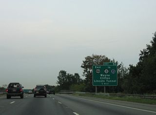 An entrance ramp joins I-80 east from CR 613 (Two Bridges Road) ahead of the Passaic River, the Passaic County line and Wayne Township. Meeting I-80 next is New Jersey Route 23 south to U.S. 46 east by Willowbrook Mall.