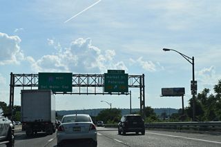 Exit 59 departs for Market Street from within the directional interchange joining I-80 with Route 20.