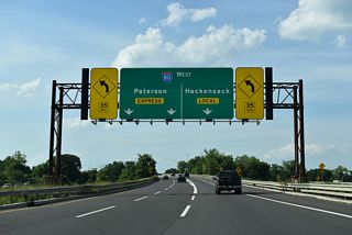 Interstate 80 commences west from a directional T interchange with I-95. Paterson is eight miles to the west, followed by Parsippany in 25 miles and the Delaware Water Gap in 68 miles.