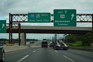 Interstate 95 crosses over U.S. 206 and Blacks Creek ahead of the trumpet interchange (Exit 7) and access roadway between the Turnpike and US route. Beyond a short overlap with U.S. 130, U.S. 206 continues to White Horse and into the capital city of Trenton in 4.7 miles.